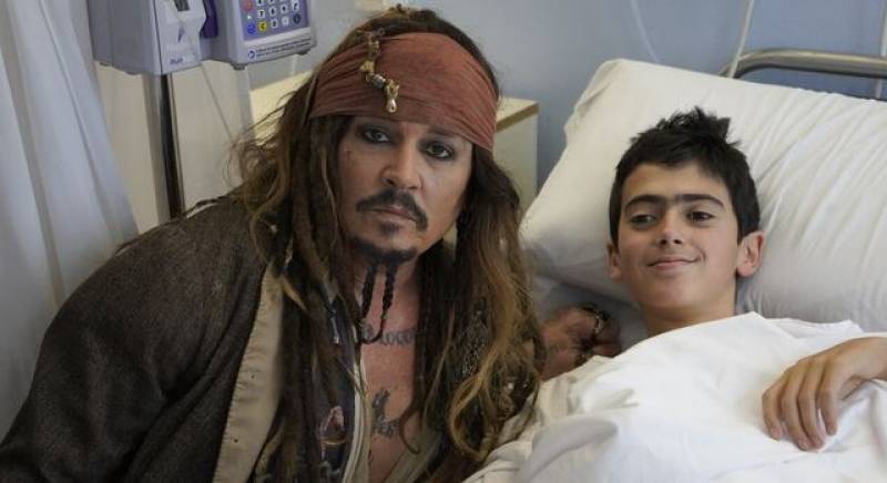 VIDEO: Johnny Depp turns up dressed as Jack Sparrow at children's ward in Spanish hospital