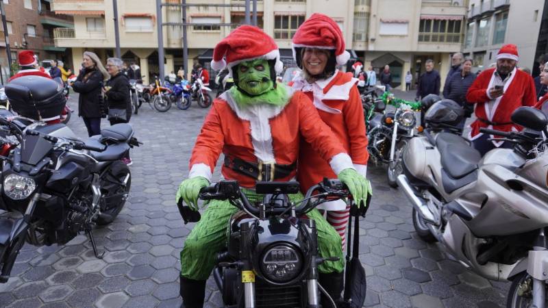 Revving up for Christmas! Santas on bikes help those in need
